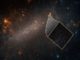 Ein Bild der Großen Magellanschen Wolke. Das kleine Bild stammt vom Hubble-Teleskop und zeigt viele Sternhaufen in der Zwerggalaxie. Zu den Sternen gehören auch Cepheiden, die für die Messung der Distanzen herangezogen werden. (Credits: NASA, ESA, A. Riess (STScI / JHU) and Palomar Digitized Sky Survey)