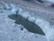 Die Kalbungslinie des Helheim-Gletschers am 15. August 2019, aufgenommen von der Oceans Melting Greenland Mission. (Credits: NASA / Josh Willis)