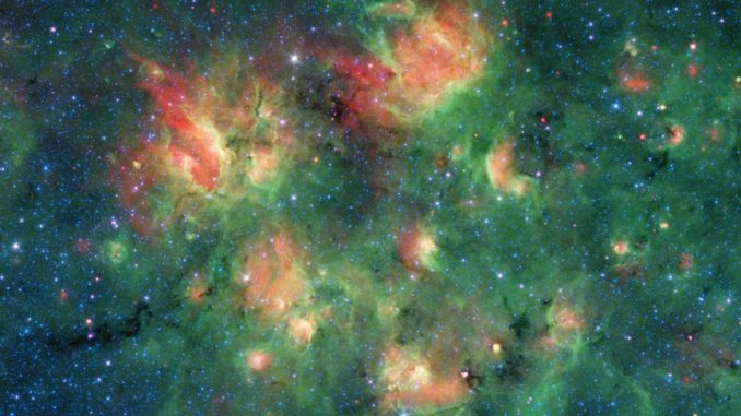 Eine Sternentstehungsregion im Sternbild Adler, aufgenommen vom Weltraumteleskop Spitzer in infraroten Wellenlängen. (Credits: NASA / JPL-Caltech)