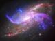 Die Spiralgalaxie NGC 4258, basierend auf Daten der Weltraumteleskope Chandra, Hubble, Spitzer und des Very Large Array. (Credit: Image Credit: X-ray: NASA / CXC / Caltech / P. Ogle et al; Optical: NASA / STScI; IR: NASA / JPL-Caltech; Radio: NSF / NRAO / VLA)