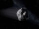 Illustration des kleinen, erdnahen Asteroiden 2020 SW im Weltraum. (Credits: NASA / JPL-Caltech)