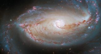 Hubble-Aufnahme der Balkenspiralgalaxie NGC 1097. (Credits: ESA / Hubble & NASA, D. Sand, K. Sheth)