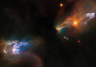 Hubble-Aufnahme der Herbig-Haro-Objekte HH 1 (oben rechts) und HH 2 (unten links). (Credits: ESA / Hubble & NASA, B. Reipurth, B. Nisini)
