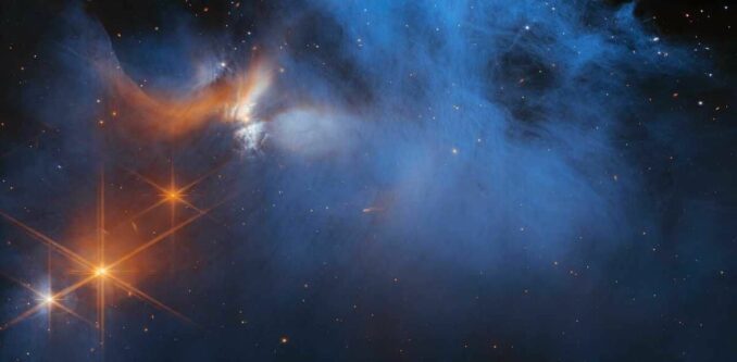 Das Zentrum der Molekülwolke Chamäleon I. (Courtesy of NASA / ESA / CSA / M. Zamani (ESA / Webb) / M. K. McClure (Leiden Observatory) / F. Sun (Steward Observatory) / Z. Smith (Open University) / Ice Age ERS Team) Das Zentrum der Molekülwolke Chamäleon I. (Courtesy of NASA / ESA / CSA / M. Zamani (ESA / Webb) / M. K. McClure (Leiden Observatory) / F. Sun (Steward Observatory) / Z. Smith (Open University) / Ice Age ERS Team)